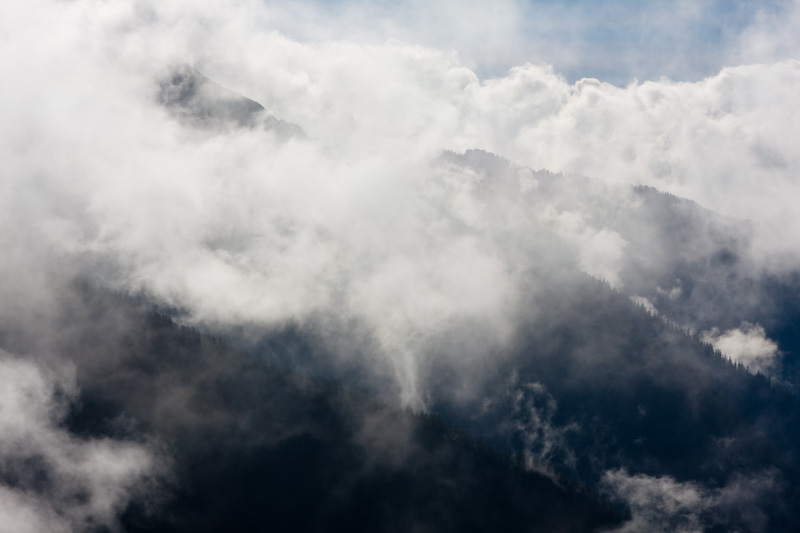 Peaks Through Clouds